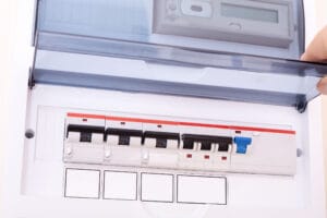 Electric circuit breaker panel with cover open.